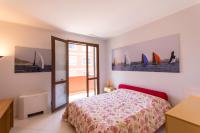 Posteľ alebo postele v izbe v ubytovaní Terrazza Sul Mare