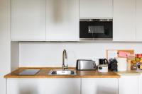 A kitchen or kitchenette at Guest House Poerio88