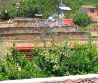 Jardín al aire libre en Apartamentos Rurales San Juan