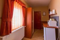 A kitchen or kitchenette at Erika Vendégház