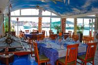 Reštaurácia alebo iné gastronomické zariadenie v ubytovaní Marina Frapa Resort Rogoznica