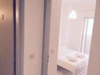 Posteľ alebo postele v izbe v ubytovaní Korona Beach Apartments II