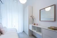 A bed or beds in a room at Apartamentos Diaber Gerona 22