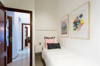 A bed or beds in a room at Apartamentos Diaber Gerona 22