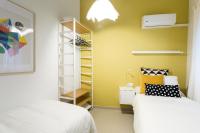 A bed or beds in a room at Apartamentos Diaber Gerona 22