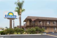 a days inn sign in front of a building at Days Inn by Wyndham in San Bernardino in San Bernardino