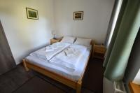 Posteľ alebo postele v izbe v ubytovaní Rotter Lajos Turistaház