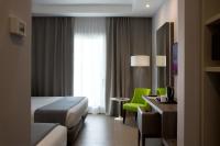 Posteľ alebo postele v izbe v ubytovaní Hotel Marad