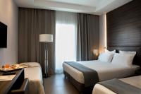 Posteľ alebo postele v izbe v ubytovaní Hotel Marad