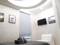 Televízia a/alebo spoločenská miestnosť v ubytovaní Silver house