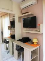 TV a/nebo společenská místnost v ubytování Orange Central Studio Heraklion