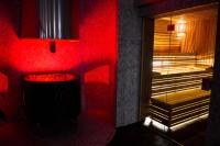 Łóżko lub łóżka w pokoju w obiekcie Kőkapu Vadászkastély és Hotel & Apartments