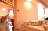 A bed or beds in a room at Casa Chatrian