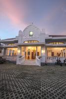 a building with a sign that reads city asylum at Griya Asih in Yogyakarta