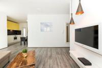 TV a/nebo společenská místnost v ubytování City Smart Apartment