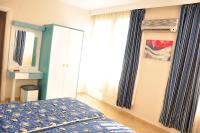 Postel nebo postele na pokoji v ubytování Belle Ocean Apart Otel