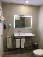 Kúpeľňa v ubytovaní Hotel Valjunco
