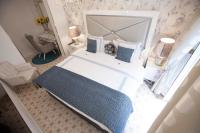 Postel nebo postele na pokoji v ubytování Hostal Casa Boutique