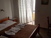 Postel nebo postele na pokoji v ubytování Drosia Hotel