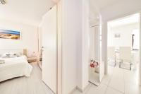 Posteľ alebo postele v izbe v ubytovaní Apartments Gvarda