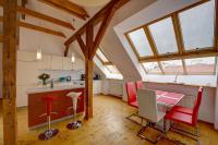 a kitchen and dining room with skylights at Residence St Havel Prague Old Town in Prague