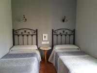 Posteľ alebo postele v izbe v ubytovaní Apartamentos Serendipia