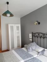 Posteľ alebo postele v izbe v ubytovaní Apartamentos Serendipia