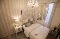 Postel nebo postele na pokoji v ubytování Hostal Casa Boutique
