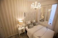 Postel nebo postele na pokoji v ubytování Hostal Casa Boutique