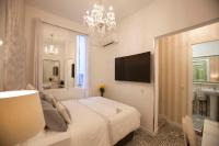 TV a/nebo společenská místnost v ubytování Hostal Casa Boutique