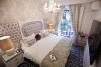 Postel nebo postele na pokoji v ubytování Hostal Casa Boutique