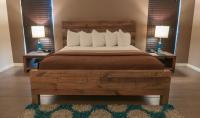 Ein Bett oder Betten in einem Zimmer der Unterkunft Thunderbird Boutique Hotel