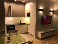 Telewizja i/lub zestaw kina domowego w obiekcie Millennium Awangarda Green