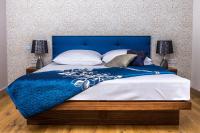 Posteľ alebo postele v izbe v ubytovaní Apartamenty Glamour