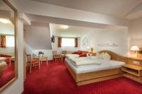 Łóżko lub łóżka w pokoju w obiekcie Das Wismeyer - Skihotel an der Plattenkarbahn