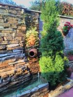 A garden outside Gelov Hotel