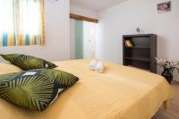 Postel nebo postele na pokoji v ubytování A Ensuite Apartment con Zona de Patio