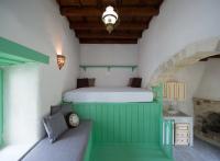 Posteľ alebo postele v izbe v ubytovaní Hartso - Traditional loft, renovated former forge in Gennadi