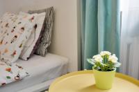 Posteľ alebo postele v izbe v ubytovaní KATO Apartamenty Centrum