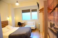 A bed or beds in a room at Maite Urban Dreams