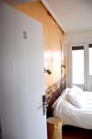 A bed or beds in a room at Maite Urban Dreams