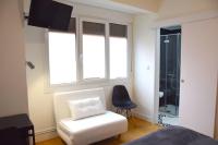 A bed or beds in a room at Maite Urban Dreams
