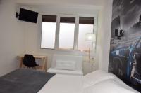 A bed or beds in a room at Maite Urban Dreams
