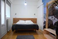 A bed or beds in a room at Maite Urban Dreams