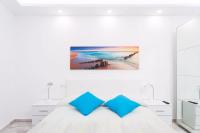 A bed or beds in a room at 1107 SEA VIEW PLAYA Las AMERICAS and SWIMMING POOL