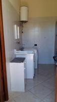 A kitchen or kitchenette at Appartamento 3