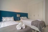 Posteľ alebo postele v izbe v ubytovaní Belaire 4 bedroom apartment