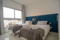 Posteľ alebo postele v izbe v ubytovaní Belaire 4 bedroom apartment