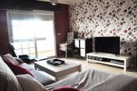 Televízia a/alebo spoločenská miestnosť v ubytovaní Apartamento San Luis