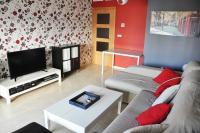 Televízia a/alebo spoločenská miestnosť v ubytovaní Apartamento San Luis